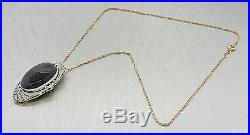 1920s Antique Art Deco 14k Gold Platinum Top Onyx Diamond Pendant Necklace