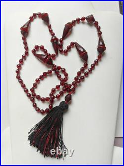 A 1920s Art Deco String Of Cherry Amber Bakelite Beads
