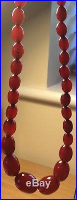 ANTIQUE ART DECO CHERRY AMBER BAKELITE NECKLACE. BEADS. 61.7 grams Tested