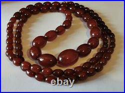 ANTIQUE CHERRY AMBER BAKELITE GRADUATED NECKLACE 124cm & 115g BEADS 10mm to 32mm