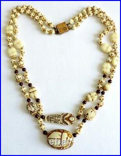 An Art Deco Czech Neiger Brothers Egyptian Cream Coloured Glass Necklace