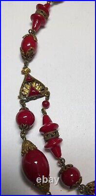 Antique Art Deco MAX NEIGER BROS sign Dark Red Glass Necklace Ornate Brass