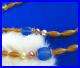 Antique Czech Honey & Blue color glass long necklace 48 long Art Deco