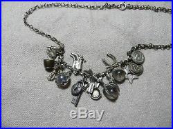 Art Deco 40's Sterling Silver Multi Charms Western/Mexico Pool of Light Necklace