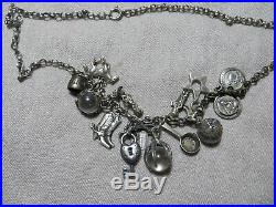 Art Deco 40's Sterling Silver Multi Charms Western/Mexico Pool of Light Necklace