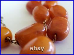 Art Deco Butterscotch Amber Barrel Bead Choker Y Necklace 22 39 grams GF Metal