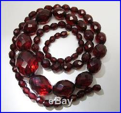 Art Deco Era Faceted And Graduated 31-Inch Cherry Amber Bakelite Necklace