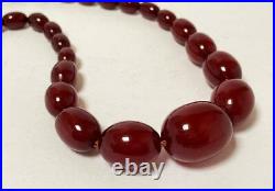 CHERRY AMBER BAKELITE MARBLED FATURAN OVAL BEADS NECKLACE 38.3 gms PRAYER WORRY