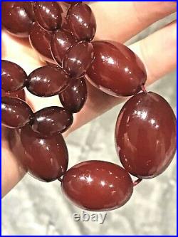 Early Cherry Amber Bakelite Oval Barrel beads Necklace 67 grams