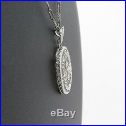 Vintage Art Deco Camphor Glass Pendant Necklace 10k White Gold. 05 ct Diamond